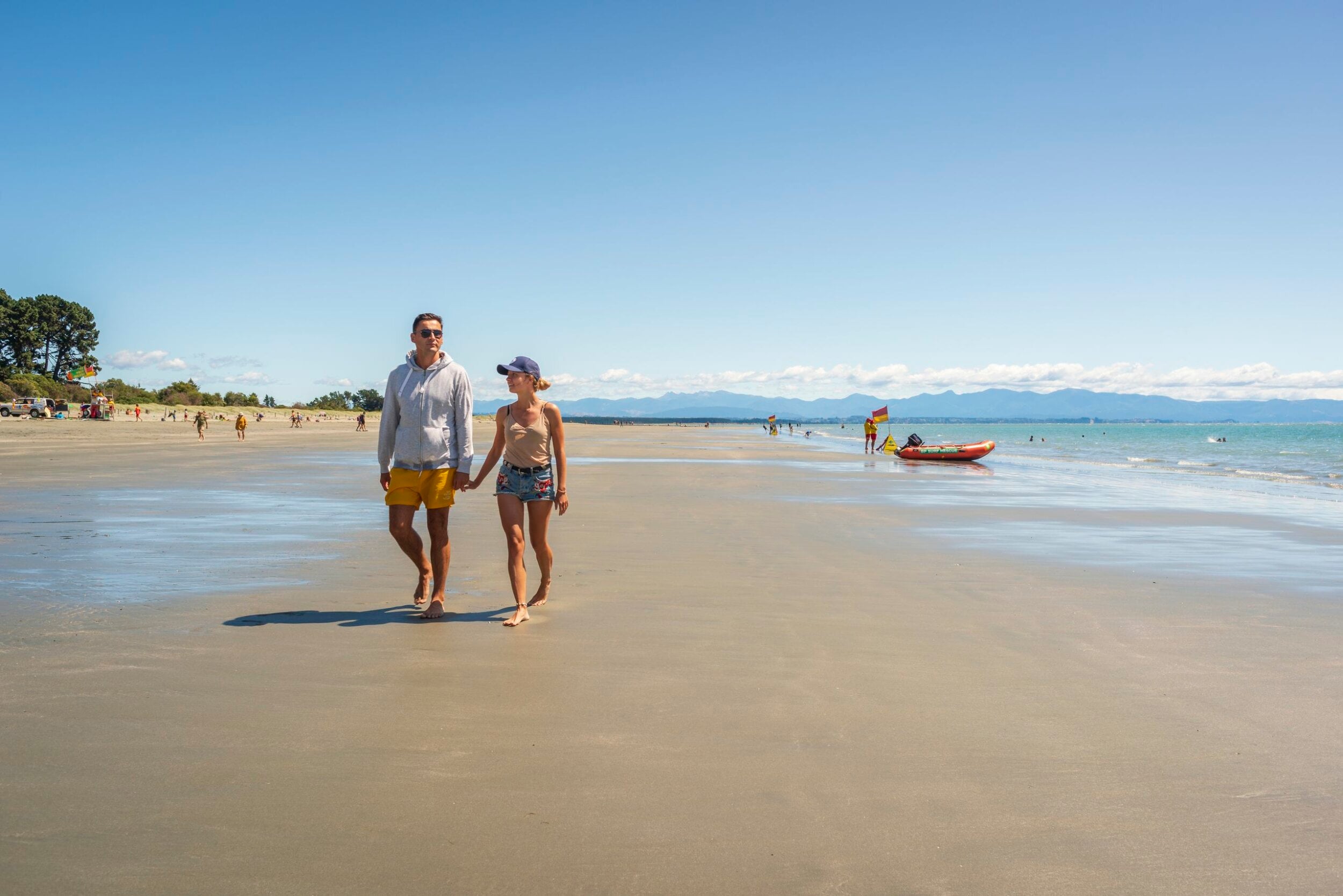 191638 walking on tahunanui beach web 2560px